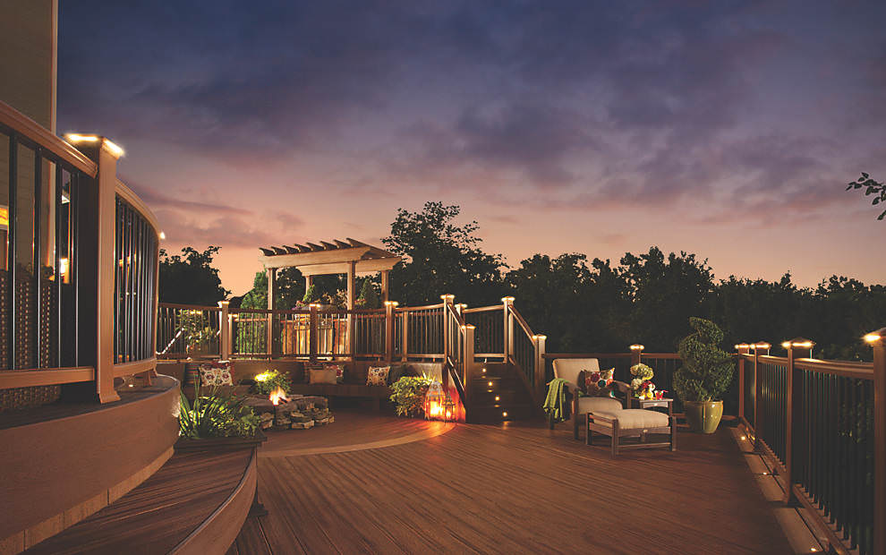 Deck with lighting on railings at dusk